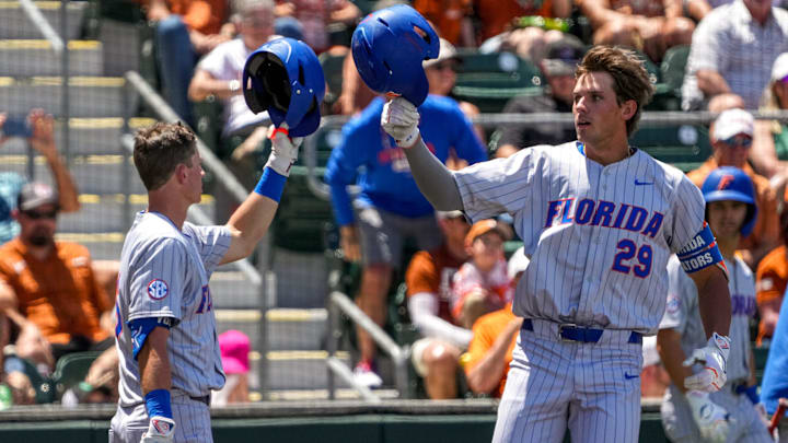 Florida catcher Brody Donay (29) and infielder Bobby Boser (6) celebrate a home run by Donay during the game against the Texas Longhorns at UFCU Disch-Falk Field on Sunday, May 11, 2025 in Austin.