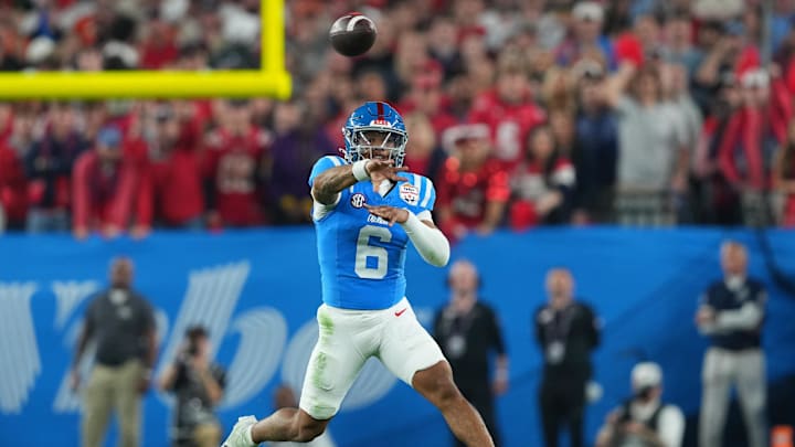 Jan 8, 2026; Glendale, AZ, USA; Mississippi Rebels quarterback Trinidad Chambliss (6) throws a pass agains the Miami Hurricanes in the second half during the 2026 Fiesta Bowl and semifinal game of the College Football Playoff at State Farm Stadium. Mandatory Credit: Joe Camporeale-Imagn Images