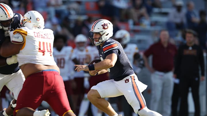Nov 16, 2024; Auburn, Alabama, USA;  Auburn Tigers quarterback Walker White (9) carries against the Louisiana Monroe Warhawks during the fourth quarter at Jordan-Hare Stadium.  Mandatory Credit: John Reed-Imagn Images