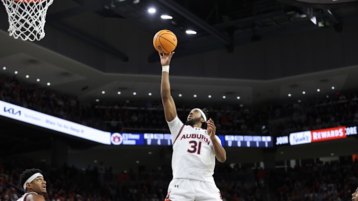 Jan 14, 2025; Auburn, Alabama, USA;  Auburn Tigers forward Chaney Johnson (31) takes an open shot against the Mississippi State Bulldogs during the second half at Neville Arena. Mandatory Credit: John Reed-Imagn Images