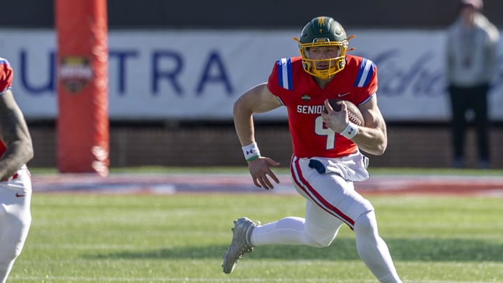 Jan 31, 2026; Mobile, AL, USA;  National quarterback Cole Payton (9) of North Dakota State runs the ball during the first half of the 2026 Senior Bowl at University of South Alabama, Hancock Whitney Stadium. Mandatory Credit: Vasha Hunt-Imagn Images