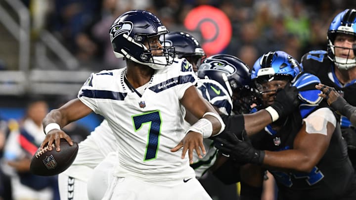 Sep 30, 2024; Detroit, Michigan, USA; Seattle Seahawks quarterback Geno Smith (7) throws a pass against the Detroit Lions in the first quarter at Ford Field. Mandatory Credit: Lon Horwedel-Imagn Images