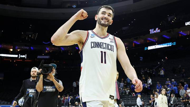 Mar 22, 2026; Philadelphia, PA, USA; UConn Huskies forward Alex Karaban (11) reacts after defeating the UCLA Bruins in  a second round game of the men's 2026 NCAA Tournament at Xfinity Mobile Arena. Mandatory Credit: Bill Streicher-Imagn Images