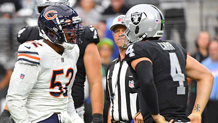 Oct 10, 2021; Paradise, Nevada, USA; Chicago Bears outside linebacker Khalil Mack (52) taunts Las Vegas Raiders quarterback Derek Carr (4) after making a sack at Allegiant Stadium. Mandatory Credit: Stephen R. Sylvanie-Imagn Images