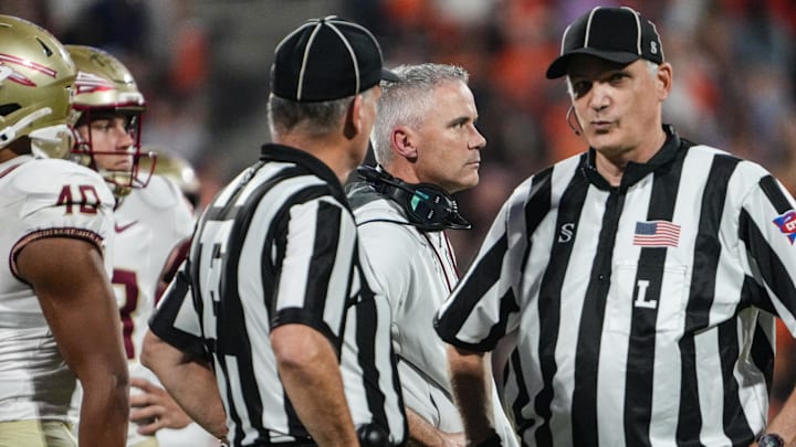 Nov 8, 2025; Clemson, South Carolina, USA; Florida State Seminoles head Coach Mike Norvell waits for a video review decision against the Clemson Tigers during the second quarter at Memorial Stadium. Mandatory Credit: Ken Ruinard - GREENVILLE NEWS-USA TODAY Network via Imagn Images Nov 8, 2025; Clemson, South Carolina, USA; Florida State Seminoles head Coach Mike Norvell waits for a video review decision against the Clemson Tigers during the second quarter at Memorial Stadium. Mandatory Credit: Ken Ruinard - GREENVILLE NEWS-USA TODAY Network via Imagn Images
