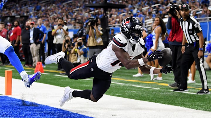 Aug 23, 2025; Detroit, Michigan, USA; Houston Texans wide receiver Quintez Cephus (14) attempts to catch a pass against the Detroit Lions the fourth quarter at Ford Field. Mandatory Credit: Eamon Horwedel-Imagn Images