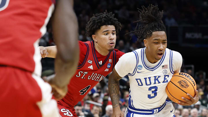 Mar 27, 2026; Washington, DC, USA;Duke Blue Devils guard Isaiah Evans (3) dribbles the ball past St. John's Red Storm guard Oziyah Sellers (4) in the first half during a Sweet Sixteen game of the East Regional of the men's 2026 NCAA Tournament at Capital One Arena.