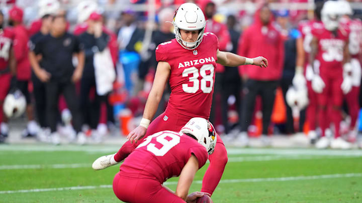 Dec 7, 2025; Glendale, Arizona, USA; Arizona Cardinals kicker Chad Ryland (38) kicks a field goal during the first half at State Farm Stadium. Mandatory Credit: Joe Camporeale-Imagn Images
