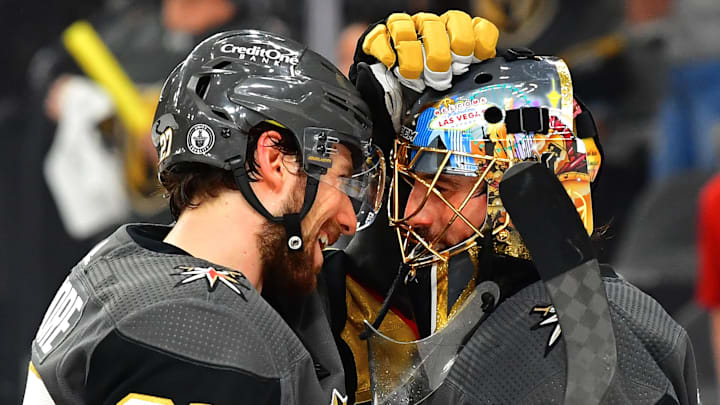 Jun 14, 2021; Las Vegas, Nevada, USA; Vegas Golden Knights defenseman Shea Theodore (27) congratulates Vegas Golden Knights goaltender Marc-Andre Fleury (29) after the Golden Knights defeated the Montreal Canadiens 4-1 in game one of the 2021 Stanley Cup Semifinals at T-Mobile Arena. Mandatory Credit: Stephen R. Sylvanie-Imagn Images