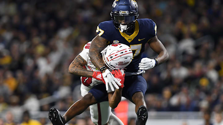 Dec 2, 2023; Detroit, MI, USA; Toledo Rockets cornerback Quinyon Mitchell (27) breaks up a pass