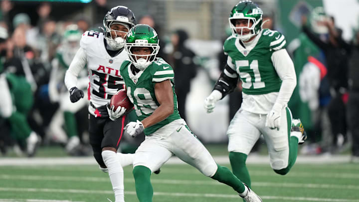 Nov 30, 2025; East Rutherford, New Jersey, USA; New York Jets wide receiver Isaiah Williams (18) makes a catch against the Atlanta Falcons during the second half at MetLife Stadium. Mandatory Credit: Robert Deutsch-Imagn Images