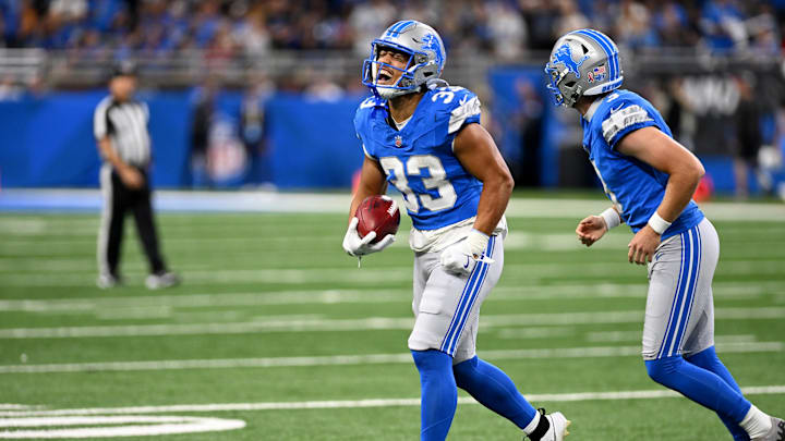 Sep 15, 2024; Detroit, Michigan, USA; Detroit Lions running back Sione Vaki (33) celebrates after getting a first down on a fake punt against the Tampa Bay Buccaneers in the second quarter at Ford Field. Mandatory Credit: Lon Horwedel-Imagn Images