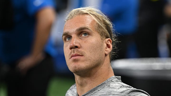 Aug 16, 2025; Detroit, Michigan, USA; Detroit Lions linebacker Alex Anzalone (34) watches the action from the bench during their preseason game against the Miami Dolphins at Ford Field. Mandatory Credit: Lon Horwedel-Imagn Images