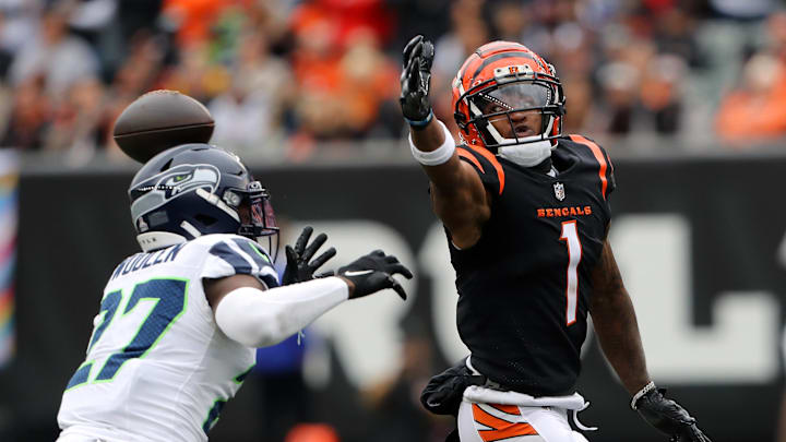 Oct 15, 2023; Cincinnati, Ohio, USA;  Cincinnati Bengals wide receiver Ja'Marr Chase (1) loses the ball as Seattle Seahawks cornerback Riq Woolen (27) defends on the play during the second quarter at Paycor Stadium. Mandatory Credit: Joseph Maiorana-Imagn Images Oct 15, 2023; Cincinnati, Ohio, USA;  Cincinnati Bengals wide receiver Ja'Marr Chase (1) loses the ball as Seattle Seahawks cornerback Riq Woolen (27) defends on the play during the second quarter at Paycor Stadium. Mandatory Credit: Joseph Maiorana-Imagn Images