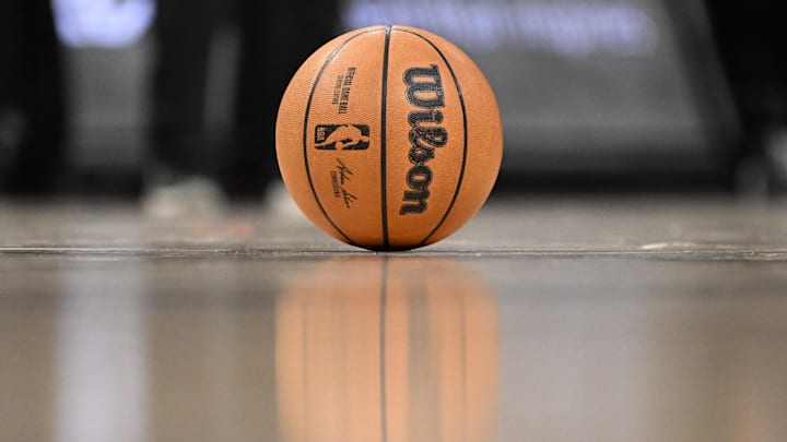 Mar 11, 2024; Detroit, Michigan, USA;  The game ball sits on the foul line as the referees review