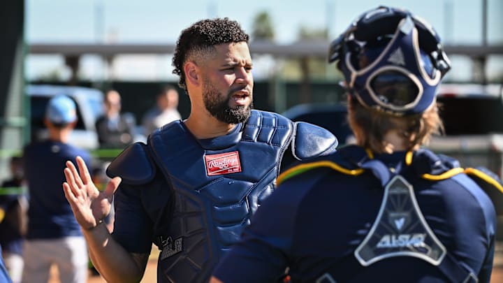Milwaukee Brewers catcher Gary Sanchez talks with teammates in the bullpen during spring training workouts Saturday, February 14, 2026, at American Family Fields of Phoenix in Phoenix, Arizona. Milwaukee Brewers catcher Gary Sanchez talks with teammates in the bullpen during spring training workouts Saturday, February 14, 2026, at American Family Fields of Phoenix in Phoenix, Arizona.