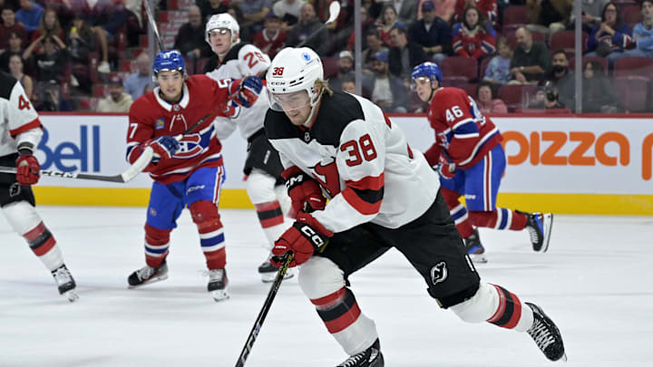 Sep 24, 2024; Montreal, Quebec, CAN; New Jersey Devils defenseman Topias Vilen (38) plays the puck against the Montreal Canadiens during the first period at the Bell Centre. Mandatory Credit: Eric Bolte-Imagn Images