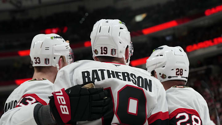 Apr 20, 2026; Raleigh, North Carolina, USA; Ottawa Senators right wing Drake Batherson (19) is congratulated by right wing Claude Giroux (28) and defenseman Nikolas Matinpalo (33) against the Carolina Hurricanes during the second period in game two of the first round of the 2026 Stanley Cup Playoffs at Lenovo Center. Mandatory Credit: James Guillory-Imagn Images