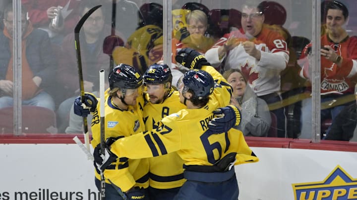 Feb 15, 2025; Montreal, Quebec, CAN; [Imagn Images direct customers only] Team Sweden defenseman Erik Karlsson (65) celebrates with teammates including forward William Nylander (88) after scoring a goal against Team Finland in the second period during a 4 Nations Face-Off ice hockey game at the Bell Centre. Mandatory Credit: Eric Bolte-Imagn Images
