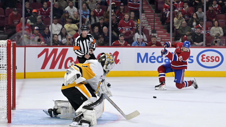 Sep 22, 2025; Montreal, Quebec, CAN;Pittsburgh Penguins goalie Sergei Murashov (1) stops Montreal Canadiens forward Ivan Demidov (93) during the overtime period at the Bell Centre. Mandatory Credit: Eric Bolte-Imagn Images Sep 22, 2025; Montreal, Quebec, CAN;Pittsburgh Penguins goalie Sergei Murashov (1) stops Montreal Canadiens forward Ivan Demidov (93) during the overtime period at the Bell Centre. Mandatory Credit: Eric Bolte-Imagn Images