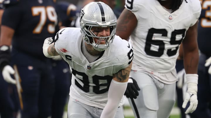 Nov 30, 2025; Inglewood, California, USA; Las Vegas Raiders defensive end Maxx Crosby (98) reacts against the Los Angeles Chargers during the first half at SoFi Stadium. Mandatory Credit: Kiyoshi Mio-Imagn Images