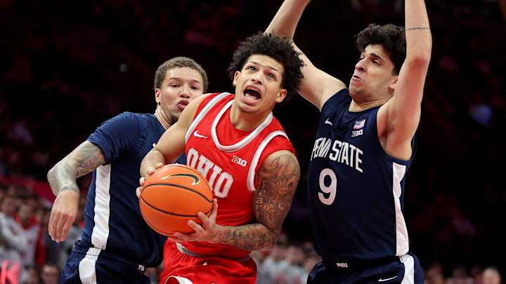 Jan 26, 2026; Columbus, Ohio, USA; Ohio State Buckeyes guard John Mobley Jr. (0) is fouled by Penn State Nittany Lions guard Melih Tunca (9) during the second half at Value City Arena.