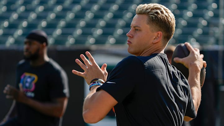 Cincinnati Bengals quarterback Joe Burrow (9) throws during warm-ups before the NFL Week 5 matchup against the Baltimore Ravens Sunday October 6, 2024 at Payor Stadium.