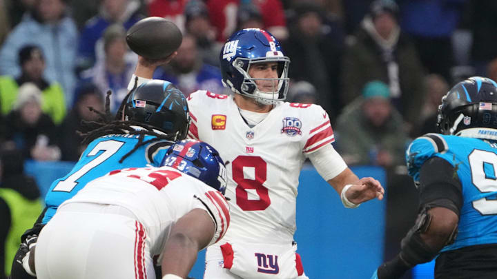 Nov 10, 2024; Munich, Germany; New York Giants quarterback Daniel Jones (8) throws the ball against the Carolina Panthers in the first half during the 2024 NFL Munich Game at Allianz Arena. Mandatory Credit: Kirby Lee-Imagn Images Nov 10, 2024; Munich, Germany; New York Giants quarterback Daniel Jones (8) throws the ball against the Carolina Panthers in the first half during the 2024 NFL Munich Game at Allianz Arena. Mandatory Credit: Kirby Lee-Imagn Images