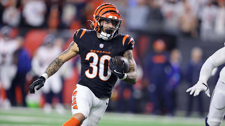 Dec 28, 2024; Cincinnati, Ohio, USA;  Cincinnati Bengals running back Chase Brown (30) runs the ball during the fourth quarter against the Denver Broncos at Paycor Stadium. Mandatory Credit: Joseph Maiorana-Imagn Images