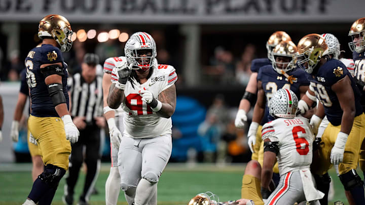 Ohio State Buckeyes defensive tackle Tyleik Williams (91) celebrates a sack against Notre Dame Fighting Irish in the third quarter during the College Football Playoff championship at Mercedes-Benz Stadium in Atlanta on January 20, 2025.