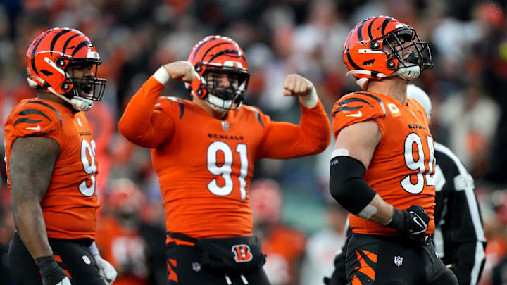Dec 4, 2022; Cincinnati, Ohio, USA; Cincinnati Bengals defensive end Sam Hubbard (94), far right, celebrates a sack with Cincinnati Bengals defensive end Trey Hendrickson (91), center, and Cincinnati Bengals defensive tackle BJ Hill (92), far left, in the second quarter of a Week 13 NFL game against the Kansas City Chiefs at Paycor Stadium. Mandatory Credit: Kareem Elgazzar-Imagn Images