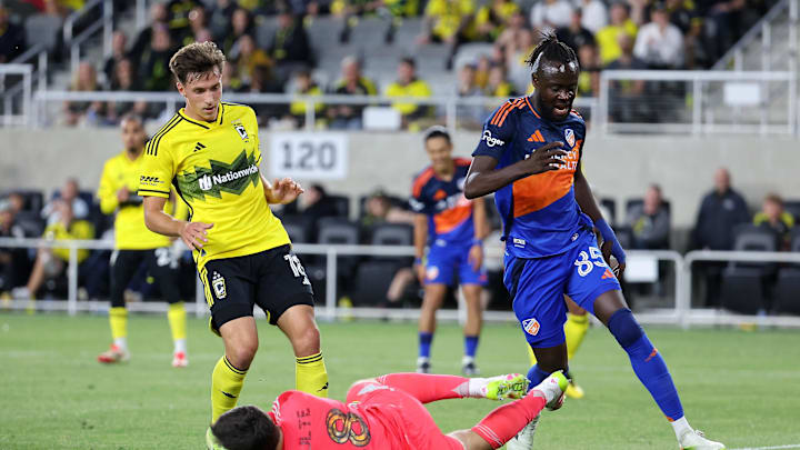 May 17, 2025; Columbus, Ohio, USA; Columbus Crew defender Malte Amundsen (18) and FC Cincinnati forward Kei Kamara (right) chase the ball during the second half at Lower.com Field. Mandatory Credit: Joseph Maiorana-Imagn Images May 17, 2025; Columbus, Ohio, USA; Columbus Crew defender Malte Amundsen (18) and FC Cincinnati forward Kei Kamara (right) chase the ball during the second half at Lower.com Field. Mandatory Credit: Joseph Maiorana-Imagn Images