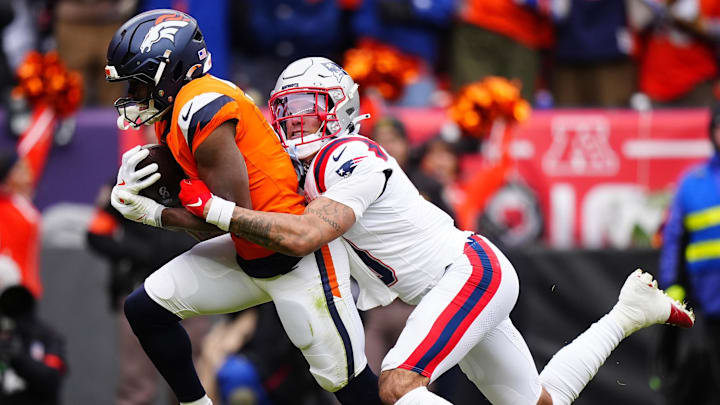 Jan 25, 2026; Denver, CO, USA; Denver Broncos wide receiver Marvin Mims Jr. (19) makes a catch against the New England Patriots during the first half in the 2026 AFC Championship Game at Empower Field at Mile High. Mandatory Credit: Ron Chenoy-Imagn Images