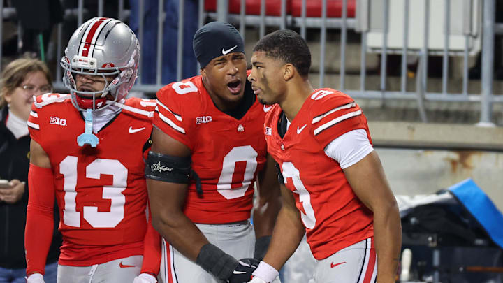 Nov 15, 2025; Columbus, Ohio, USA;  Ohio State Buckeyes cornerback Lorenzo Styles Jr. (3) celebrates with his brother linebacker Sonny Styles (0) after his punt return for a touchdown during the third quarter against the UCLA Bruins at Ohio Stadium. Mandatory Credit: Joseph Maiorana-Imagn Images