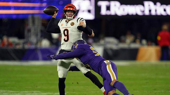 Nov 27, 2025; Baltimore, Maryland, USA; Cincinnati Bengals quarterback Joe Burrow (9) throws pass against Baltimore Ravens linebacker Kyle Van Noy (53) during the second half at M&T Bank Stadium. Mandatory Credit: Mitch Stringer-Imagn Images