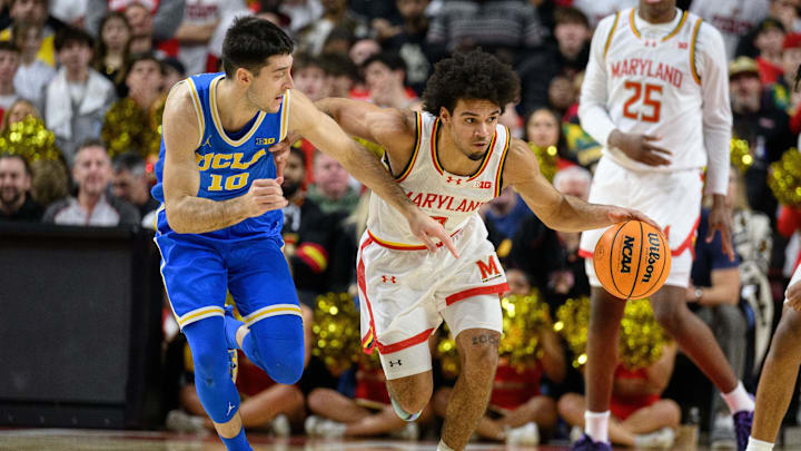 Jan 10, 2025; College Park, Maryland, USA; Maryland Terrapins guard Ja'Kobi Gillespie (0) handles the ball as UCLA Bruins guard Lazar Stefanovic (10) defends during the second half at Xfinity Center. Mandatory Credit: Reggie Hildred-Imagn Images