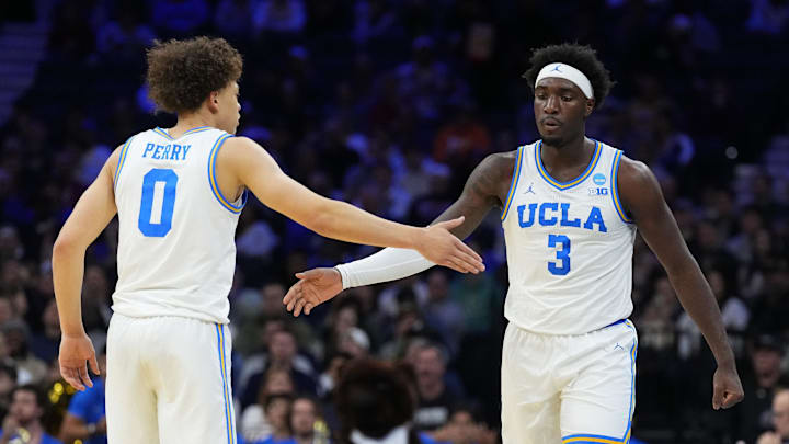 Mar 20, 2026; Philadelphia, PA, USA; UCLA Bruins forward Eric Dailey Jr. (3) and guard Trent Perry (0) react in the first half during a first round game of the men's 2026 NCAA Tournament at Xfinity Mobile Arena. Mandatory Credit: Kyle Ross-Imagn Images Mar 20, 2026; Philadelphia, PA, USA; UCLA Bruins forward Eric Dailey Jr. (3) and guard Trent Perry (0) react in the first half during a first round game of the men's 2026 NCAA Tournament at Xfinity Mobile Arena. Mandatory Credit: Kyle Ross-Imagn Images