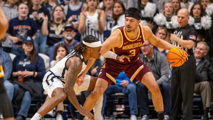 Butler guard Posh Alexander, left, defends Minnesota forward Dawson Garcia (3) during the first half of an NCAA/NIT game, Tuesday, March 19, 2024, at Hinkle Fieldhouse on the campus of Butler University in Indianapolis.
