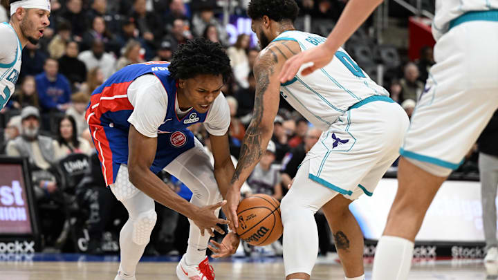 Feb 9, 2025; Detroit, Michigan, USA; Detroit Pistons forward Ausar Thompson (9) battles for a loose ball with Charlotte Hornets forward Miles Bridges (0) in the first quarter at Little Caesars Arena. Mandatory Credit: Lon Horwedel-Imagn Images Feb 9, 2025; Detroit, Michigan, USA; Detroit Pistons forward Ausar Thompson (9) battles for a loose ball with Charlotte Hornets forward Miles Bridges (0) in the first quarter at Little Caesars Arena. Mandatory Credit: Lon Horwedel-Imagn Images