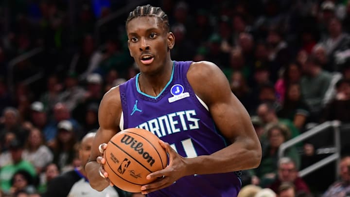 Mar 4, 2026; Boston, Massachusetts, USA;  Charlotte Hornets forward Moussa Diabate (14) drives to the basket during the second half against the Boston Celtics at TD Garden. Mandatory Credit: Bob DeChiara-Imagn Images