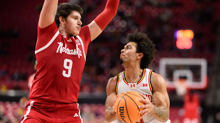 Jan 19, 2025; College Park, Maryland, USA; Maryland Terrapins guard Ja'Kobi Gillespie (0) handles the ball against Nebraska Cornhuskers forward Berke Buyuktuncel (9) during the second half at Xfinity Center.