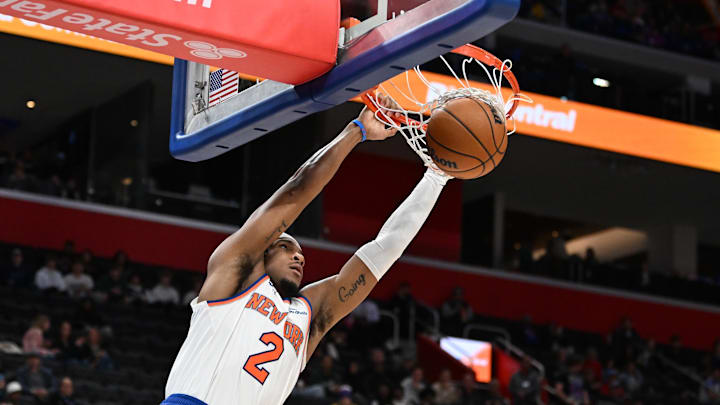 Nov 1, 2024; Detroit, Michigan, USA; New York Knicks guard Miles McBride (2) dunks the ball against the Detroit Pistons in the fourth quarter of the Pistons game against the New York Knicks at Little Caesars Arena. Mandatory Credit: Lon Horwedel-Imagn Images