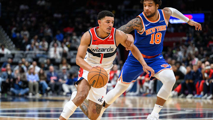 Oct 18, 2024; Washington, District of Columbia, USA; Washington Wizards guard Johnny Davis (1) dribbles the ball to the basket against New York Knicks forward Chuma Okeke (18) during the fourth quarter at Capital One Arena. Mandatory Credit: Reggie Hildred-Imagn Images Oct 18, 2024; Washington, District of Columbia, USA; Washington Wizards guard Johnny Davis (1) dribbles the ball to the basket against New York Knicks forward Chuma Okeke (18) during the fourth quarter at Capital One Arena. Mandatory Credit: Reggie Hildred-Imagn Images