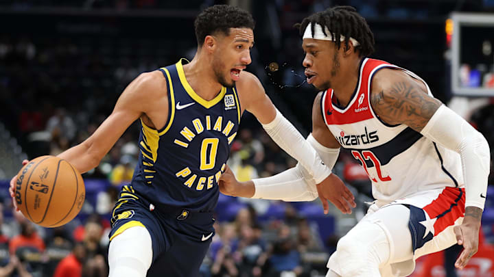 Indiana Pacers guard Tyrese Haliburton drives past Washington Wizards forward Richaun Holmes. Mandatory Credit: Daniel Kucin Jr.-Imagn Images