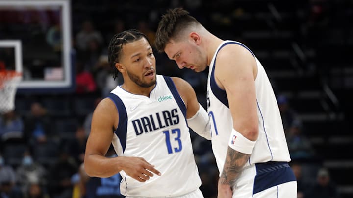 Dec 8, 2021; Memphis, Tennessee, USA; Dallas Mavericks guard Jalen Brunson (13) talks with guard Luka Doncic (77) during the first half against the Memphis Grizzles at FedExForum. Mandatory Credit: Petre Thomas-Imagn Images