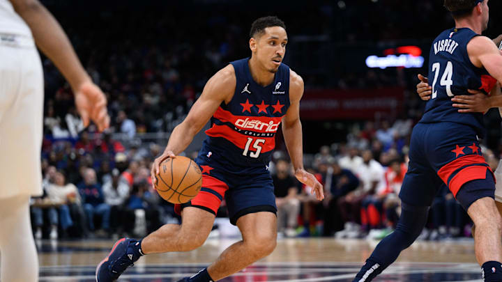 Feb 10, 2025; Washington, District of Columbia, USA; Washington Wizards guard Malcolm Brogdon (15) handles the ball during the first quarter against the San Antonio Spurs at Capital One Arena. Mandatory Credit: Reggie Hildred-Imagn Images