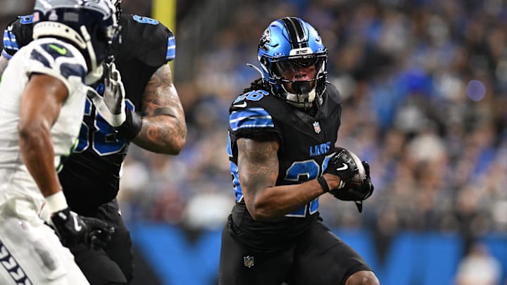 Detroit Lions running back Jahmyr Gibbs (26) runs the ball against the Seattle Seahawks in the fourth quarter Detroit Lions running back Jahmyr Gibbs (26) runs the ball against the Seattle Seahawks in the fourth quarter