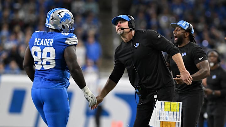 Nov 28, 2024; Detroit, Michigan, USA; Detroit Lions defensive tackle DJ Reader (98) celebrates with head coach Dan Campbell after sacking Chicago Bears quarterback Caleb Williams (18) in the fourth quarter at Ford Field. Mandatory Credit: Lon Horwedel-Imagn Images