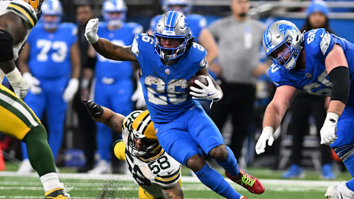 Dec 5, 2024; Detroit, Michigan, USA;  Detroit Lions running back Jahmyr Gibbs (26) runs the ball upfield against the Green Bay Packers in the fourth quarter at Ford Field. Mandatory Credit: Lon Horwedel-Imagn Images