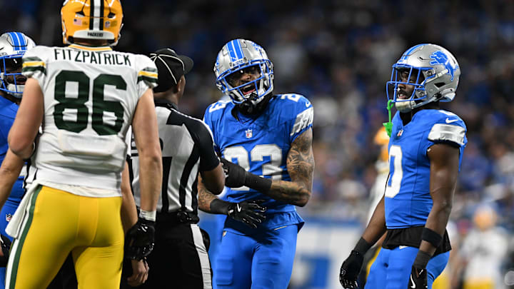 Dec 5, 2024; Detroit, Michigan, USA; Detroit Lions cornerback Carlton Davis III (23) and Green Bay Packers tight end John FitzPatrick (86) exchange words in the second quarter at Ford Field. Mandatory Credit: Lon Horwedel-Imagn Images Dec 5, 2024; Detroit, Michigan, USA; Detroit Lions cornerback Carlton Davis III (23) and Green Bay Packers tight end John FitzPatrick (86) exchange words in the second quarter at Ford Field. Mandatory Credit: Lon Horwedel-Imagn Images